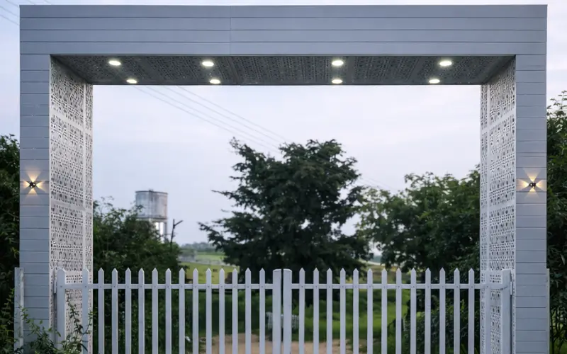 Lakeview Farms farmland entrance with secure gate and landscaped surroundings
