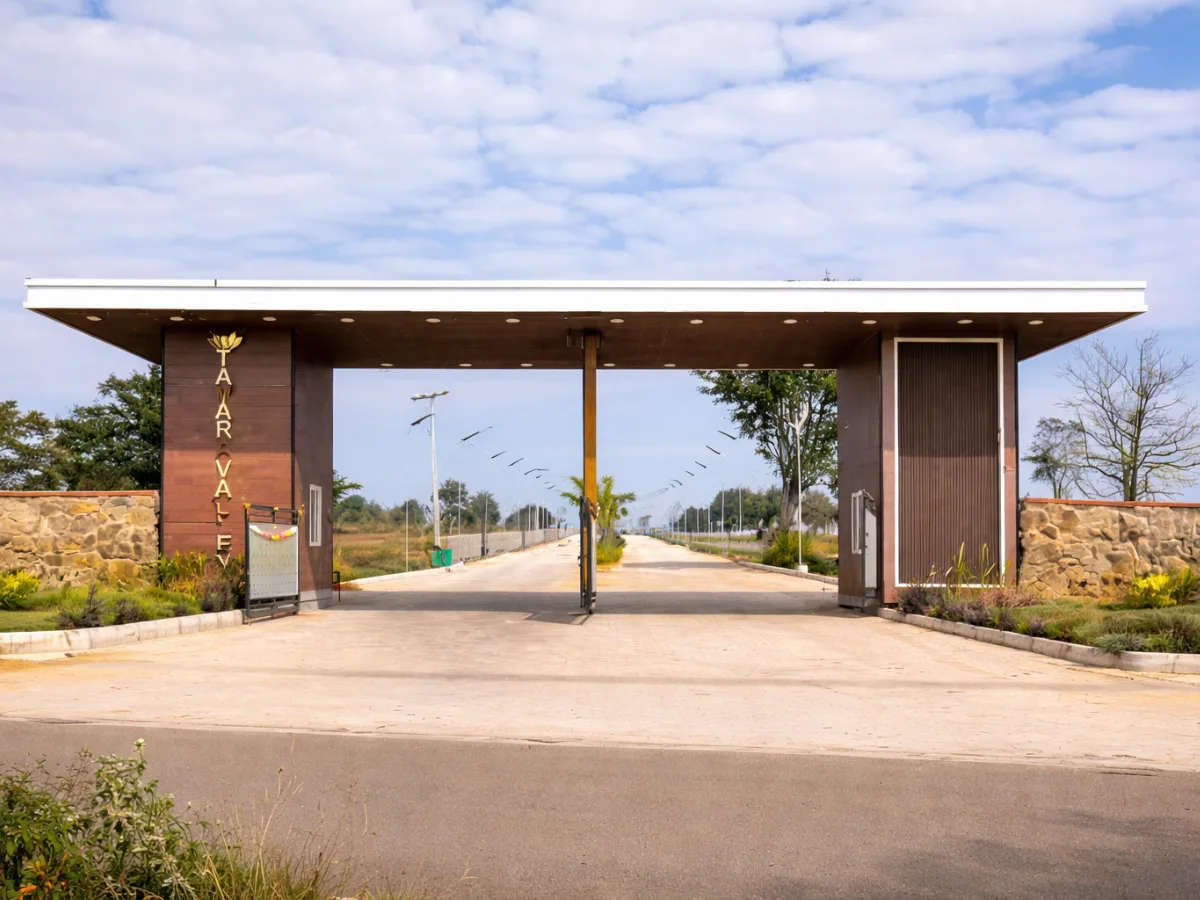 Tamara Valley farmland near anekal, entrance arch with internal roads and solar street lights at